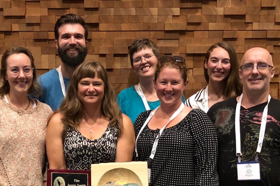 Nicola koper and her team showing off their awards.